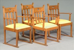 Liberty and Co. A pair of oak armchair in the manner of E G Punnett - Thumbnail 1