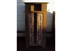 M H Baillie Scott (style of). An excellent oak Arts and Crafts hall cupboard with stylised floral carvings - Thumbnail 1
