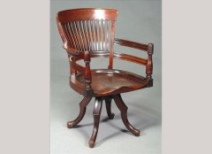 E W Godwin for James Peddle. A mahogany swivel office elbow chair - Thumbnail 1