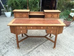 G M Ellwood for J S Henry. An Arts Crafts oak desk inlaid with stylised floral panels - Thumbnail 2