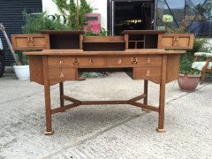 G M Ellwood for J S Henry. An Arts Crafts oak desk inlaid with stylised floral panels - Thumbnail 6