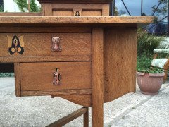 G M Ellwood for J S Henry. An Arts Crafts oak desk inlaid with stylised floral panels - Thumbnail 11