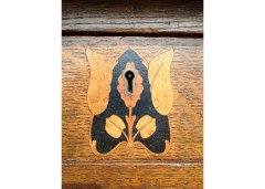G M Ellwood for J S Henry. An Arts Crafts oak desk inlaid with stylised floral panels - Thumbnail 13