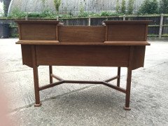 G M Ellwood for J S Henry. An Arts Crafts oak desk inlaid with stylised floral panels - Thumbnail 16