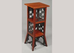 Liberty and Co. An Anglo-Moorish walnut and ebonised lamp standard - Thumbnail 1