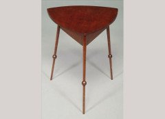 Liberty and Co (attributed). A mahogany triform occasional table in the style of E W Godwin - Thumbnail 1