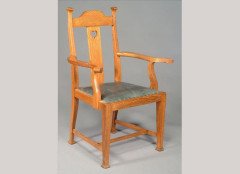 Walter Cave. An oak armchair curved back with heart cut-out to the splat - Thumbnail 1