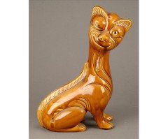 A pottery figure of an amusing seated cat winking - Thumbnail 1