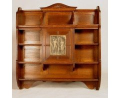 An oak hanging bookcase with open shelves placed around a central door - Thumbnail 1