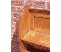 An oak hanging bookcase with open shelves placed around a central door - Thumbnail 5
