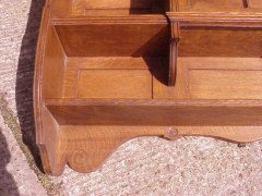 An oak hanging bookcase with open shelves placed around a central door - Thumbnail 13