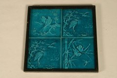 A set of four Torquoise Aesthetic movement tiles. - Thumbnail 1