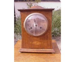 Liberty and Co. An Arts and Crafts oak mantle clock in the style of C F A Voysey - Thumbnail 1