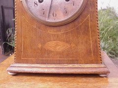 Liberty and Co. An Arts and Crafts oak mantle clock in the style of C F A Voysey - Thumbnail 4