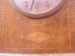 Liberty and Co. An Arts and Crafts oak mantle clock in the style of C F A Voysey - Thumbnail 5