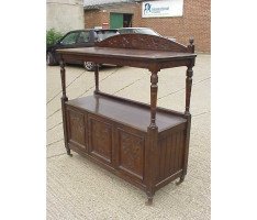 A Gothic Revival oak buffet with stylised floral carving to the top - Thumbnail 2