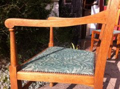 A set of four Arts and Crafts oak dining chairs covered in Morris and Co fabric - Thumbnail 11