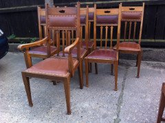 Liberty and Co (attributed). A set of seven Arts and Crafts oak dining chairs - Thumbnail 2