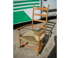 William Birch retailed by Liberty and Co. A good quality Cotswold School oak rocking chair - Thumbnail 1