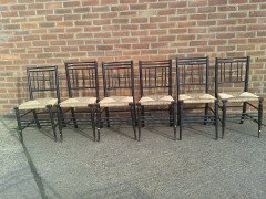 Liberty and Co. A set of Aesthetic Movement ebonised chairs after designs by Ford Maddox Brown with a Moresque style. - Thumbnail 3