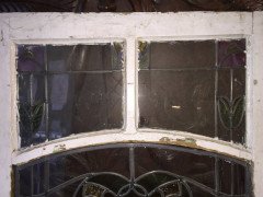 A set of stained glass doors and windows, riddled with intricate floral detailing. - Thumbnail 5