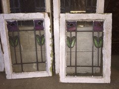 A set of stained glass doors and windows, riddled with intricate floral detailing. - Thumbnail 8