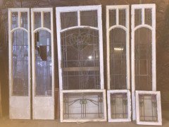 A set of stained glass doors and windows, riddled with intricate floral detailing. - Thumbnail 10