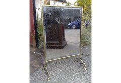 An Arts and Crafts brass fire screen - Thumbnail 1